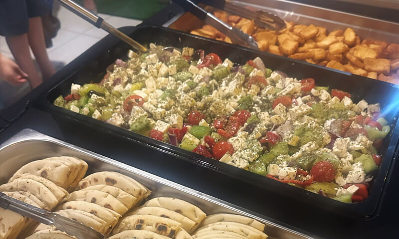Close-up of beautifully arranged Greek food platters ready for a catered event Pete the Greek